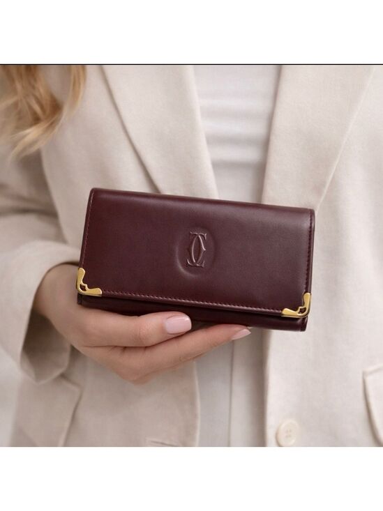 Cartier Handbags - CARTIER MUST DE CARTIER BORDEAUX LEATHER BIFOLD WALLET FRANCE GOLD HARDWARE